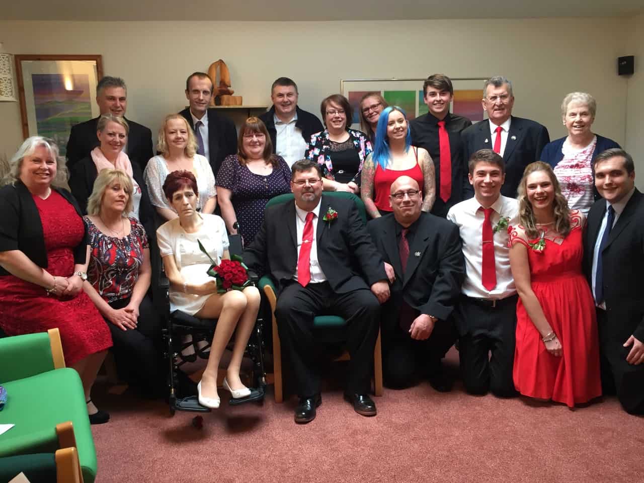 Family photo at the renewal of vows between Lisa and Paul. Led by hospice chaplain Karen Murphy.