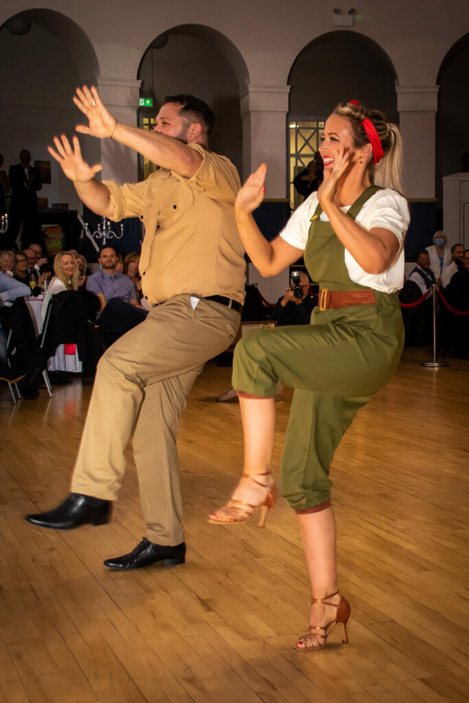 Couple dressed in vintage costumes in the ballroom at the Winter Gardens to raise money for Weston Hospicecare at a previous Strictly Fun Dancing Grand Finale.