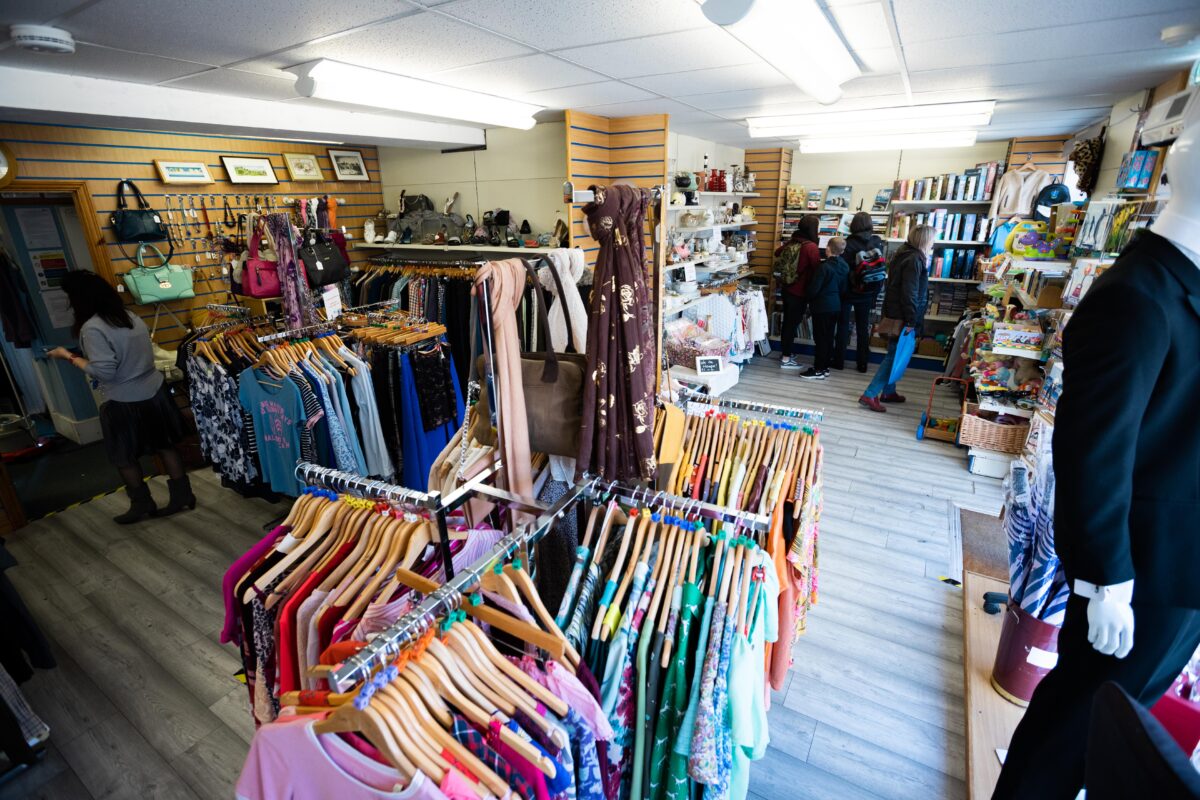 A high-angled, 180 degree shot of Weston Hospicecare's delightful Winscombe store. On show is some pre-loved fashion.